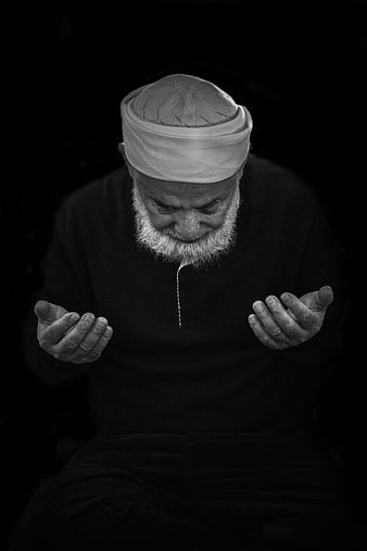 Elderly Muslim Man in Prayer with Beard and Turban