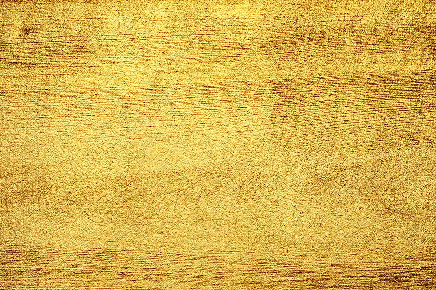 Textured Gold Metal Background with Horizontal Grain