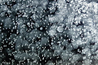 Abstract Blue Water Droplets On Glass Surface