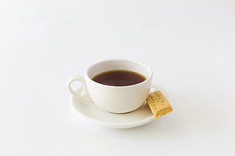 White Coffee Cup with Biscuit on Saucer