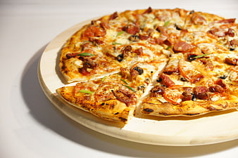 Freshly Baked Pepperoni Pizza On Wooden Serving Board