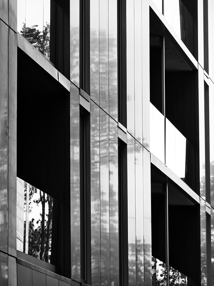 Black and White Modern Glass Building Facade Reflection