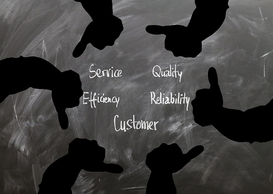 Silhouetted Hands Thumbs Up And Down Around Customer Service Keywords