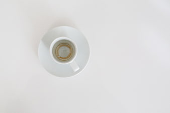 Top View of Empty Espresso Cup on White Background