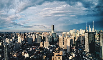 Aerial View of Shanghai Skyline with Dramatic Clouds