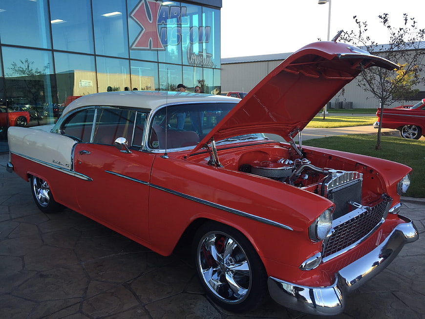 Red and White Classic Chevy Bel Air with Open Hood