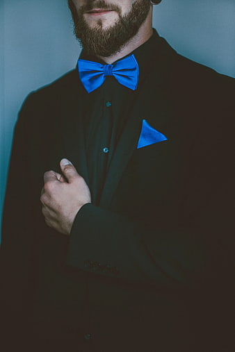 Man in Black Suit with Blue Bow Tie