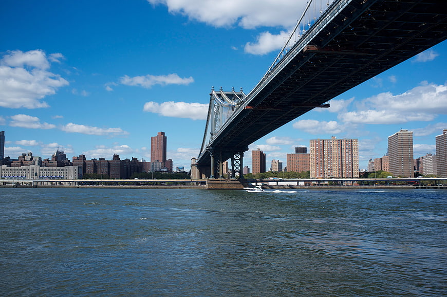 Manhattan Bridge over East River with NYC Skyline