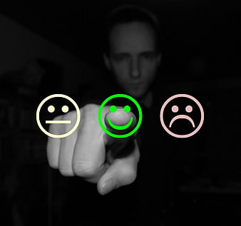 Man selecting positive feedback rating on digital interface