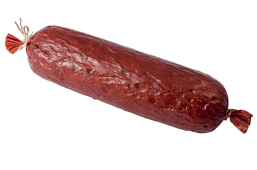 Whole cooked salami sausage on white background