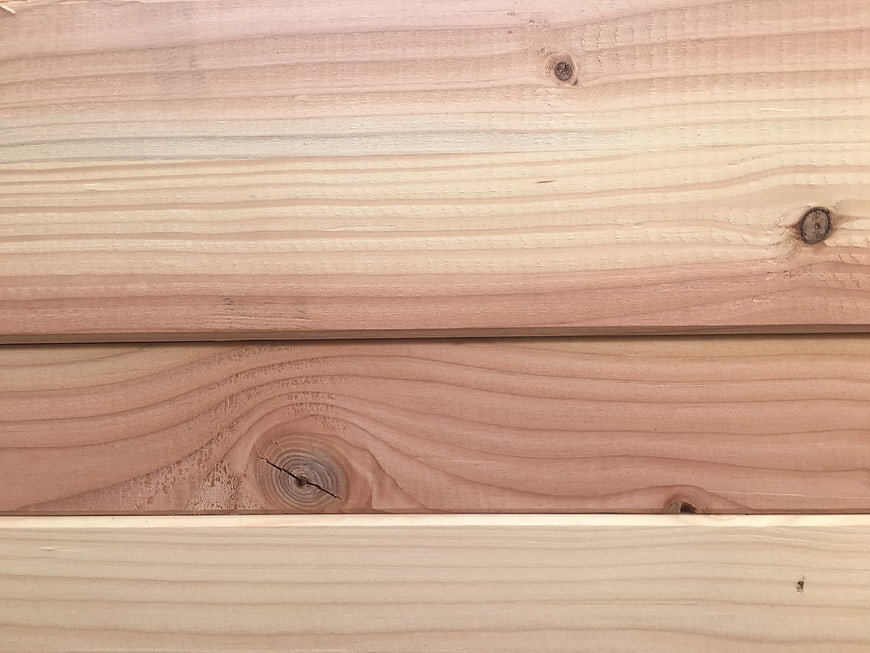 Natural Wood Plank Texture Background with Grain and Knots