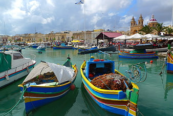 Colorful Traditional Fishing Boats In Marsaxlokk Harbor, Malta