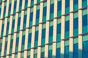 Modern office building facade with blue glass windows