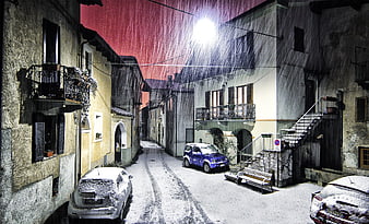 Snowy Night Street in Italian Village with Red Sky