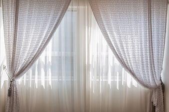 White textured curtains with soft natural light