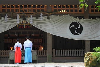 Japanese couple in traditional attire at shrine