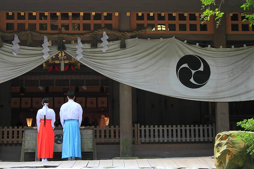 Japanese couple in traditional attire at shrine