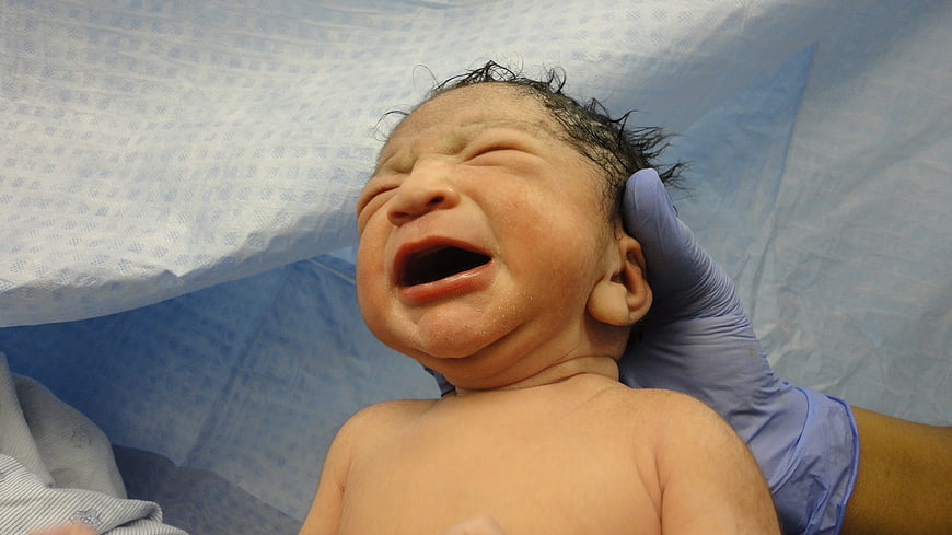 Newborn Baby Crying in Hospital Delivery Room