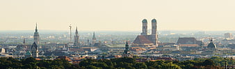 Panoramic View of Munich Skyline with Frauenkirche and St. Peter's Church