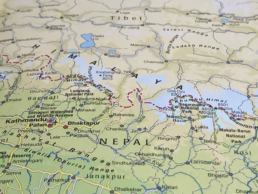 Close-up of a physical map showing Nepal, Tibet, and the Himalayan mountain range