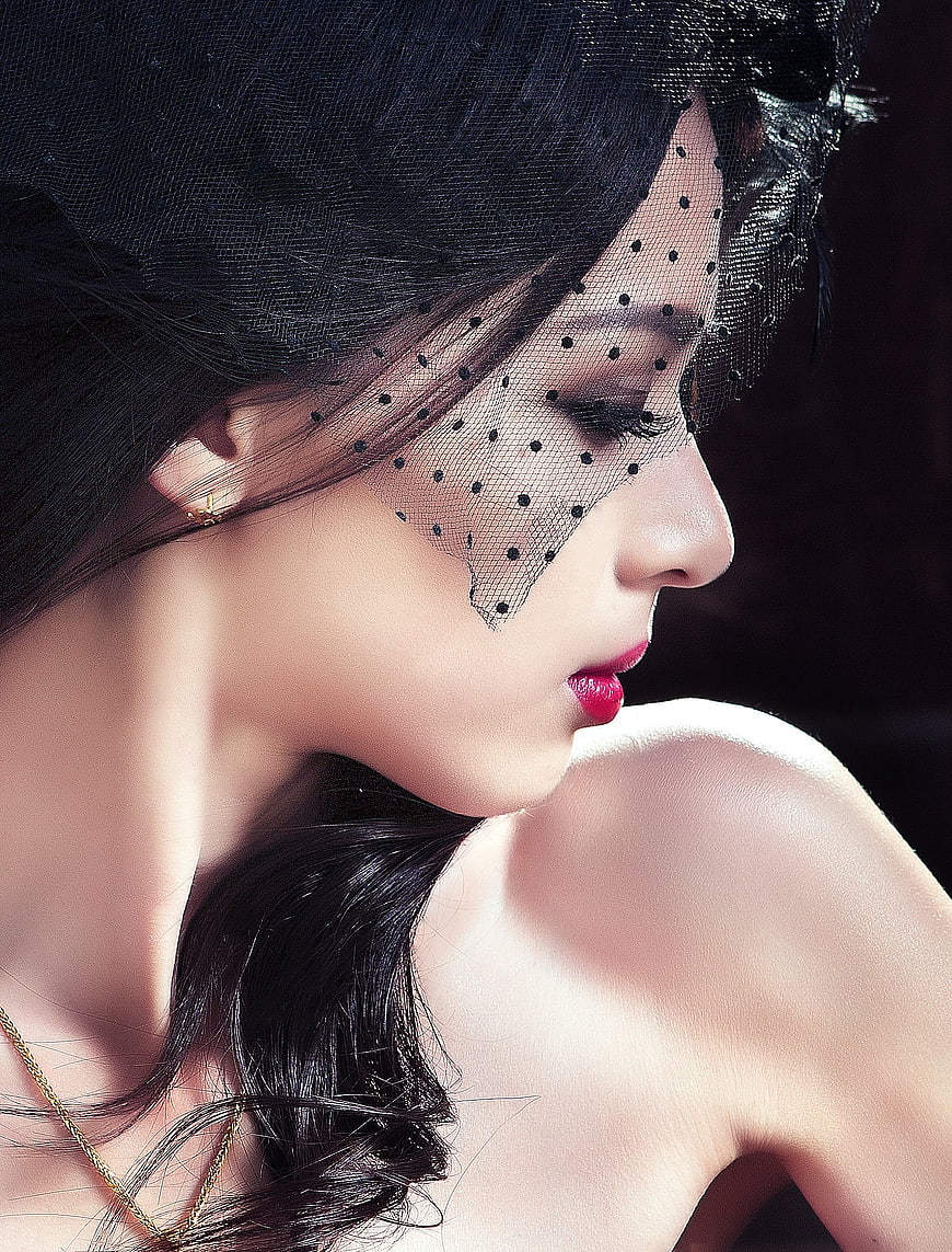 Elegant Woman in Black Polka Dot Veil Profile Portrait