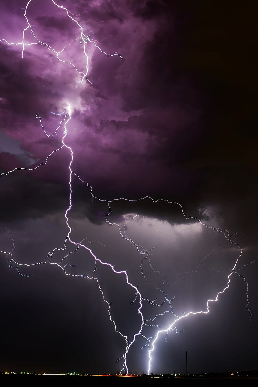 Dramatic Purple Lightning Storm at Night