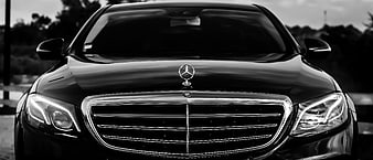 Black and White Front View of a Luxury Mercedes-Benz Sedan