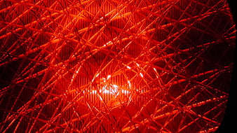 Close-up of red traffic light lens texture