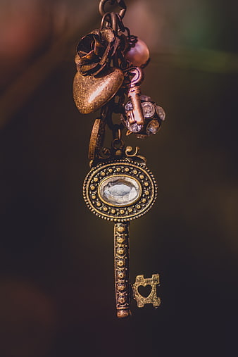 Vintage ornate key charm with heart and rose pendant