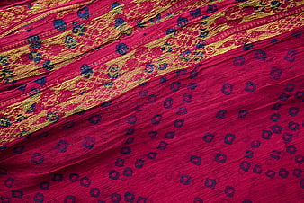 Vibrant Pink and Gold Patterned Silk Fabric Texture