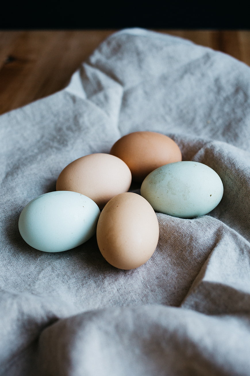 Colorful eggs on linen cloth