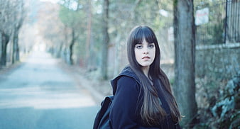 Young Woman Portrait on Quiet Forest Road
