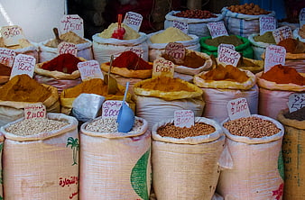 Colorful sacks of spices and legumes at a North African market