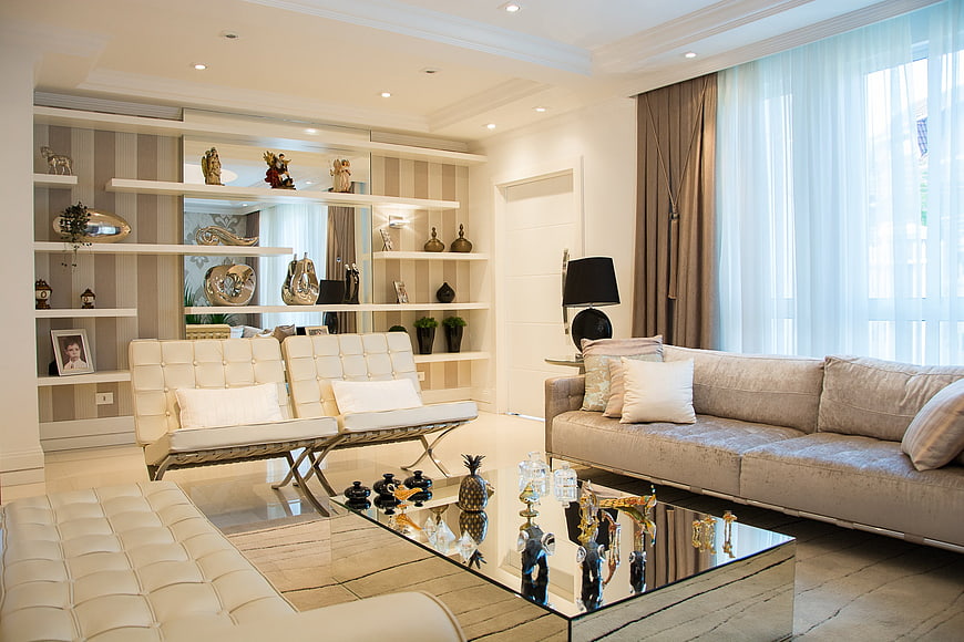 Luxurious Modern Living Room with Beige Sofa and Shelves