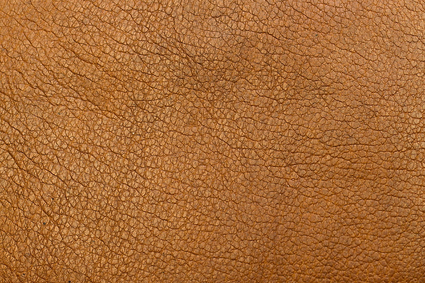 Close-up texture of brown leather material background