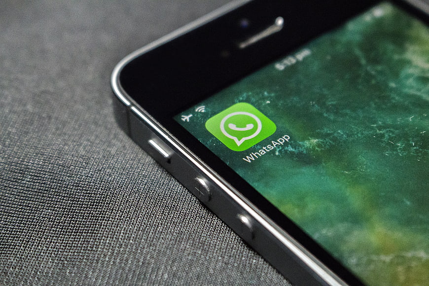 Close-up of WhatsApp app icon on smartphone screen