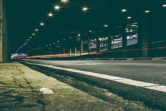 Long Exposure Night Traffic in Urban Underpass