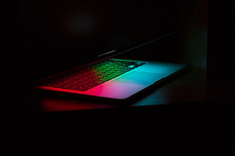 Laptop with RGB Backlit Keyboard in Dark Room