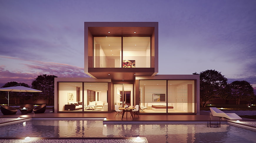 Modern luxury house with pool at twilight
