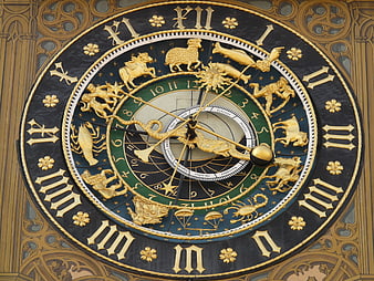 Detailed view of the Ulm Astronomical Clock face with zodiac signs