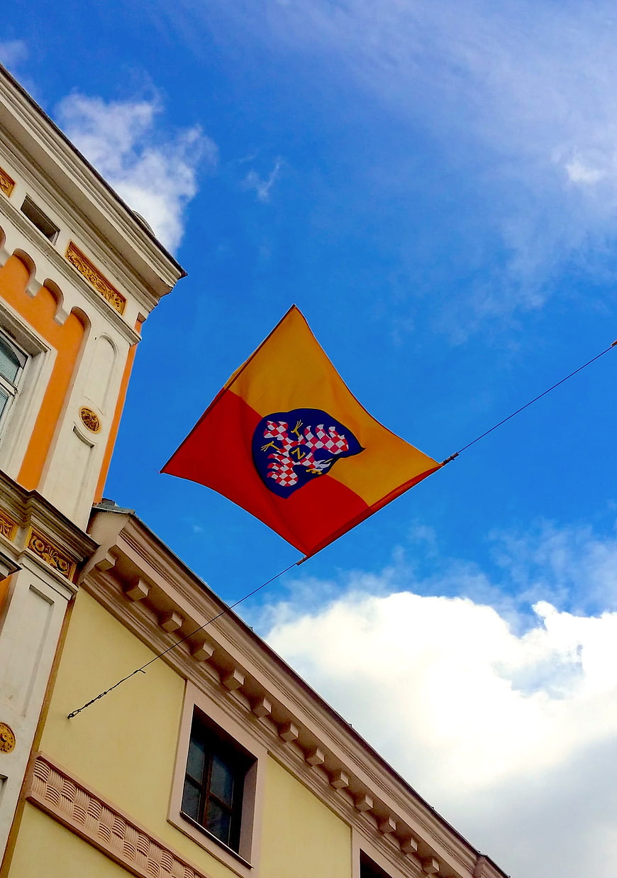 Znojmo City Flag Waving Against Blue Sky