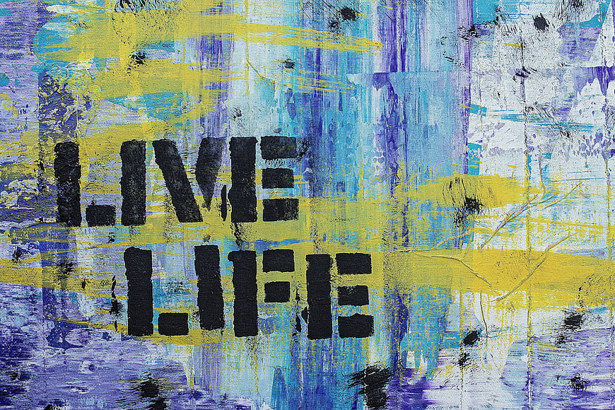 Abstract Live Life Stencil Art on Textured Background