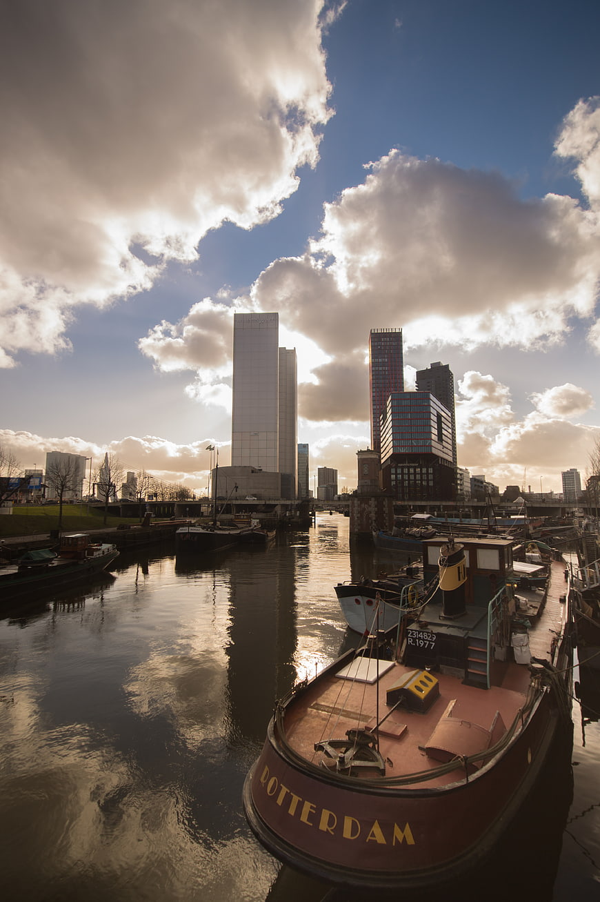 Rotterdam skyline with boats and skyscrapers