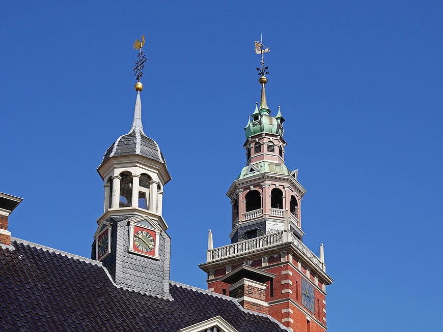 Historic clock towers against a clear blue sky