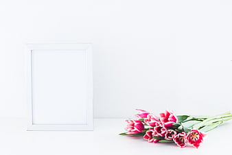 White Picture Frame Mockup with Pink Tulips on White Background