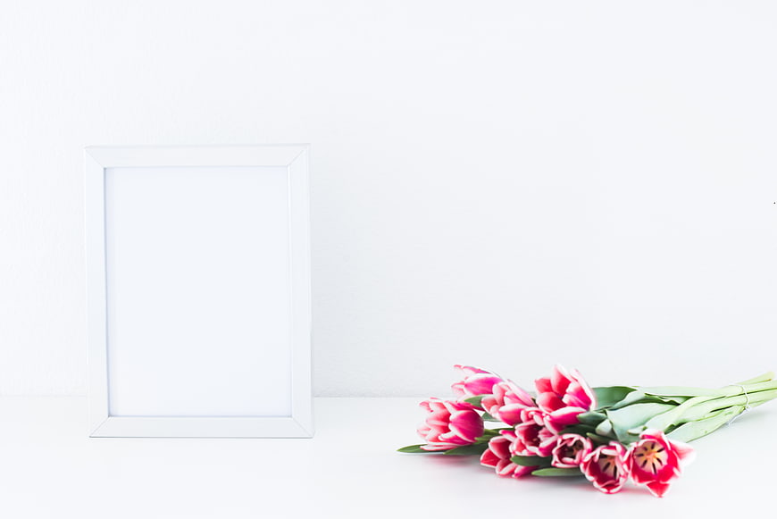 White Picture Frame Mockup with Pink Tulips on White Background