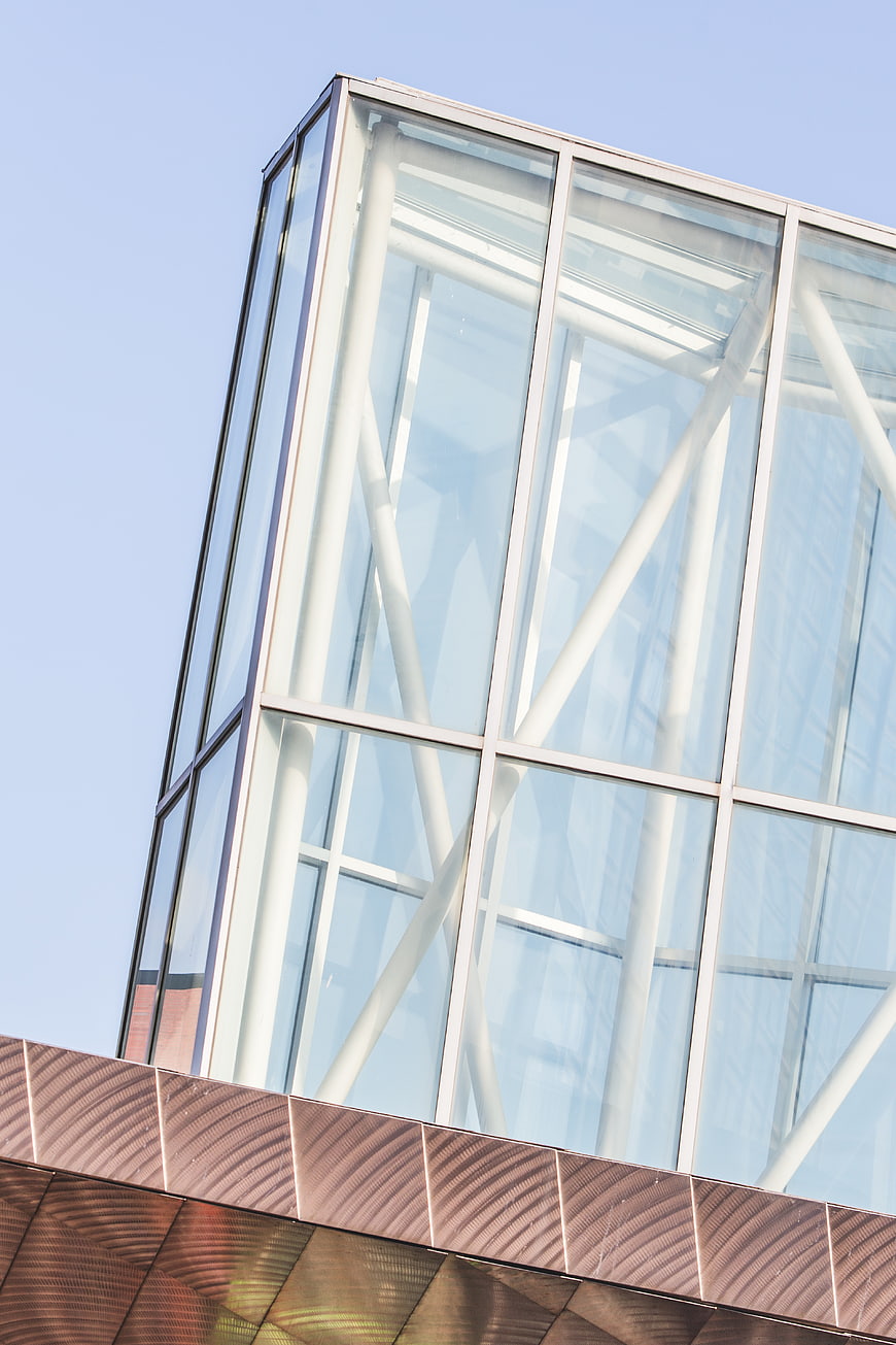 Modern Glass Building Architecture with Copper Facade