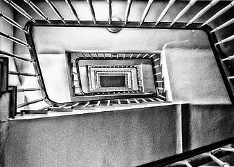 Black and white spiral staircase looking down