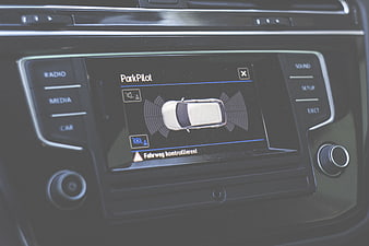 Car infotainment screen displaying ParkPilot parking assist system