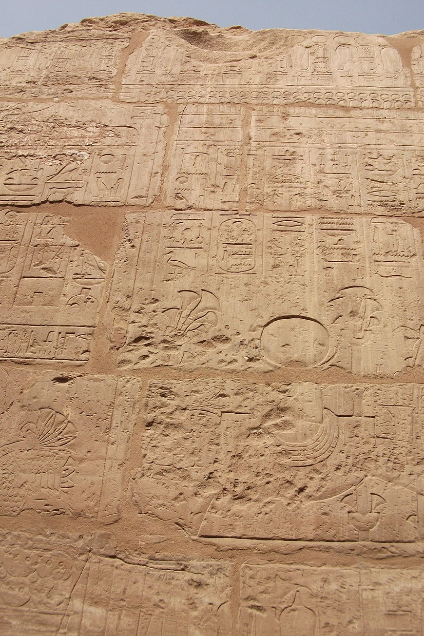 Ancient Egyptian Hieroglyphics Carved on Sandstone Wall